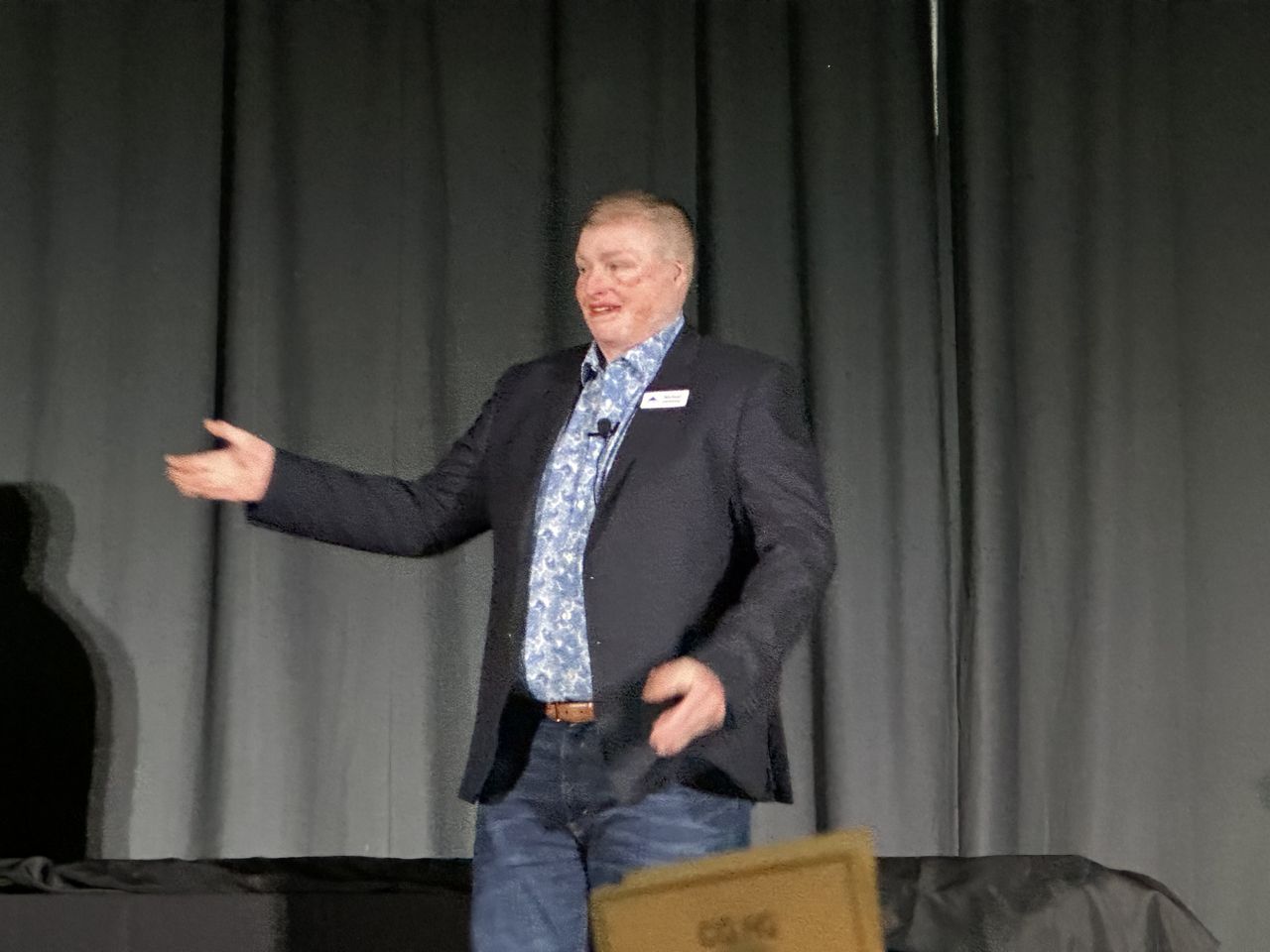 Michael Lammey speaking on stage